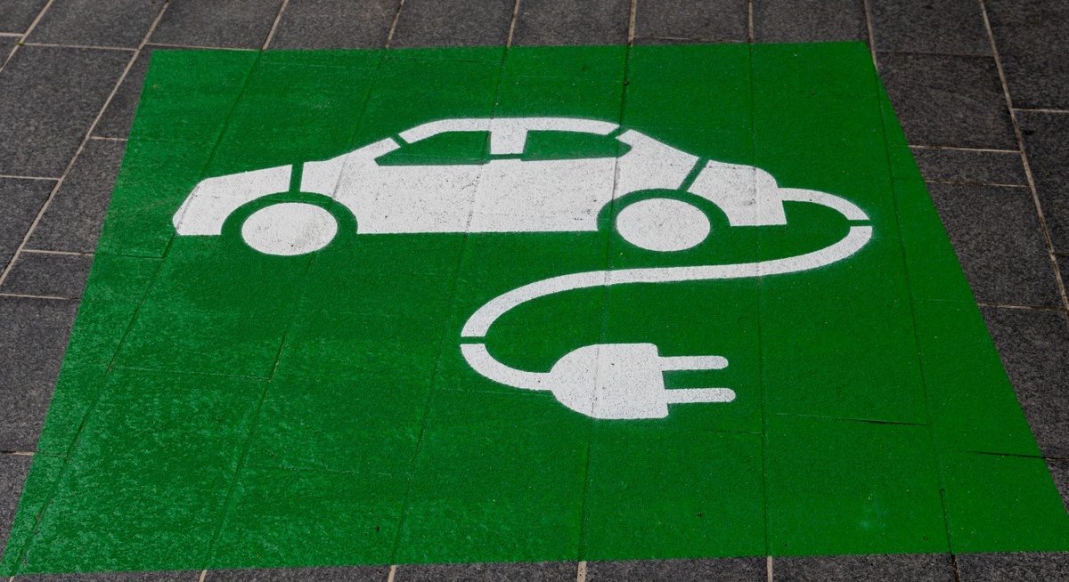 Green vehicle with plug