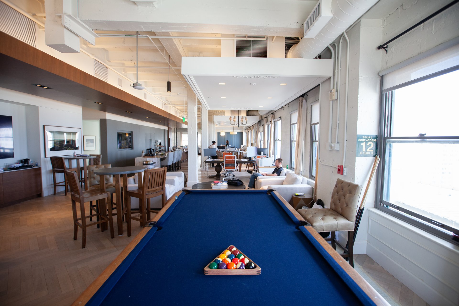 open office with pool table